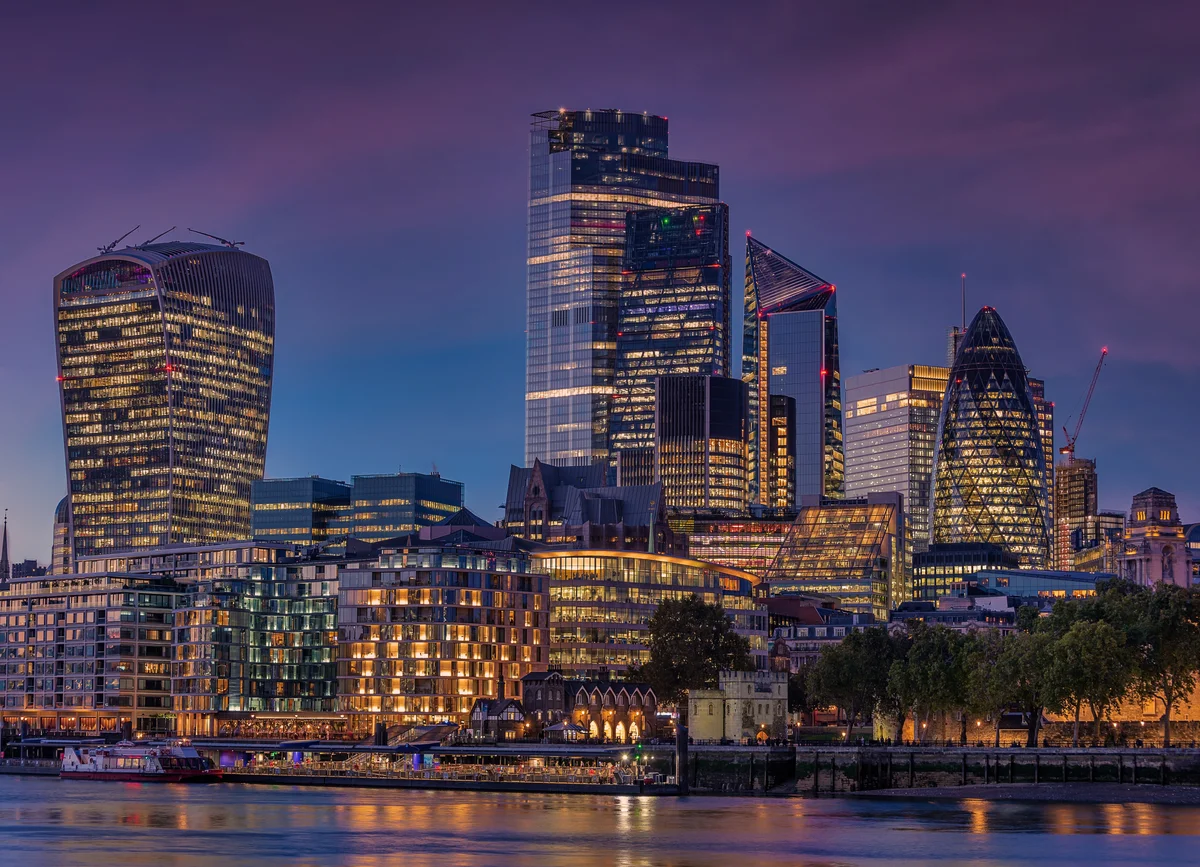 London City financial district skyline at dusk showing modern office buildings and skyscrapers for financial services